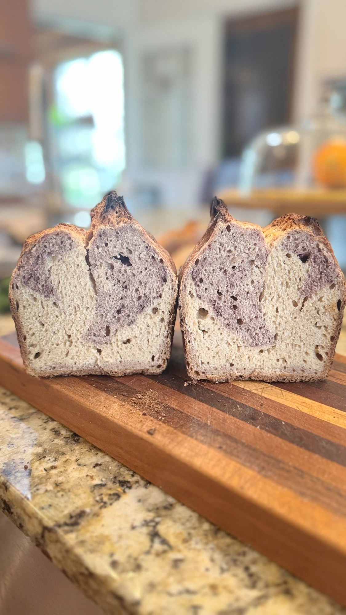 A stunning purple marbled sourdough loaf — the kind Edgar Allan Dough makes possible